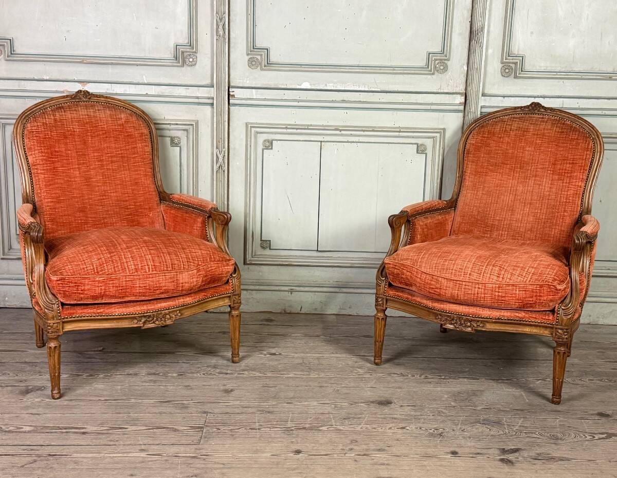 Pair of transitional carved wooden armchairs, 18th century