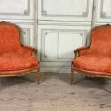 Pair of transitional carved wooden armchairs, 18th century