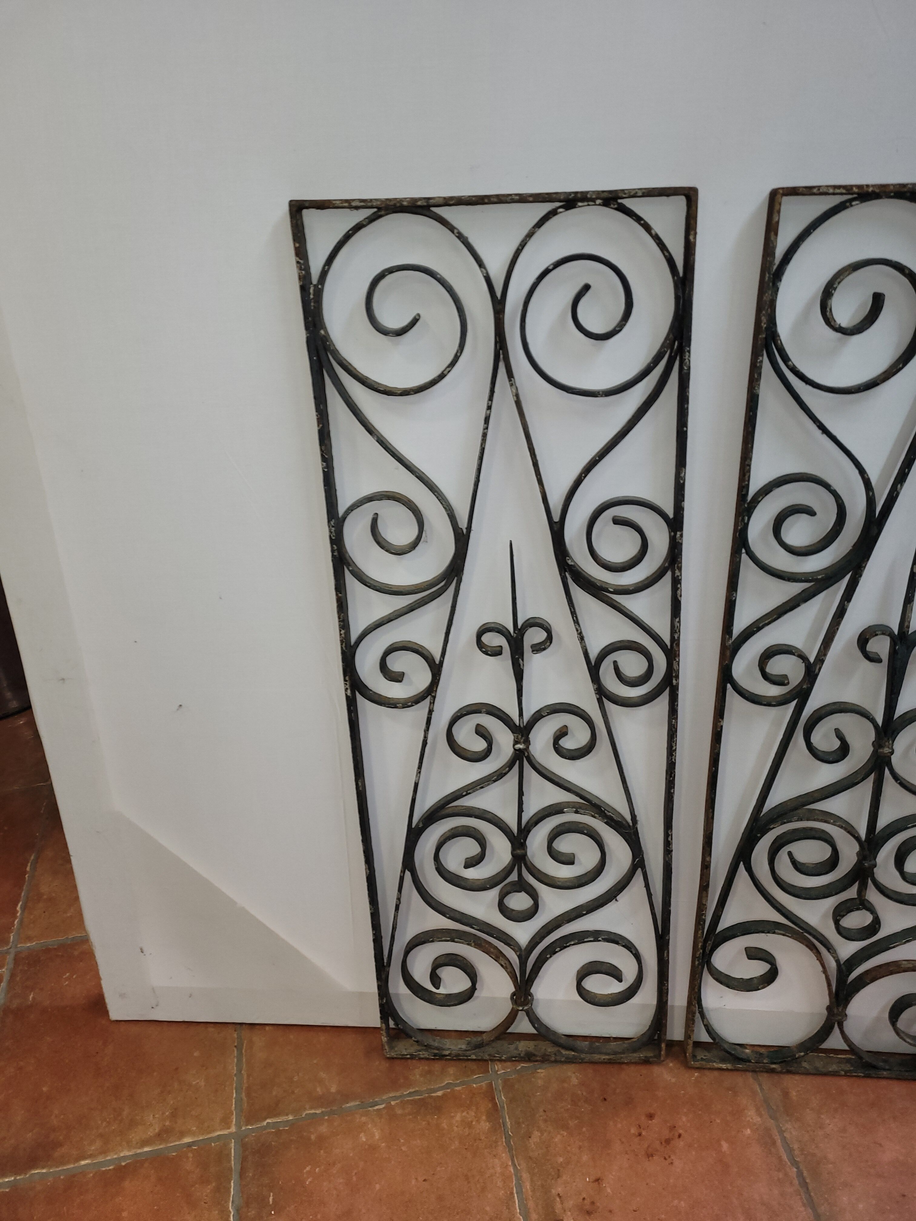 Pair of wrought iron grids