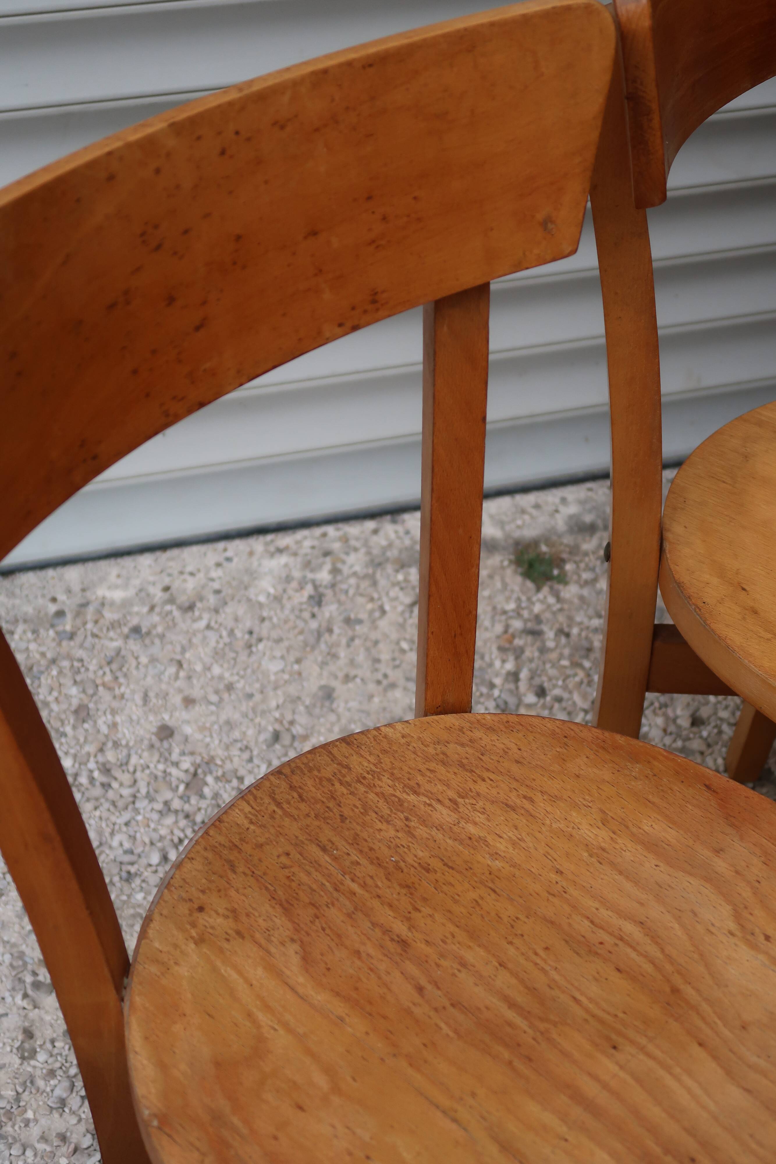 Set of 7 mismatched bistro chairs