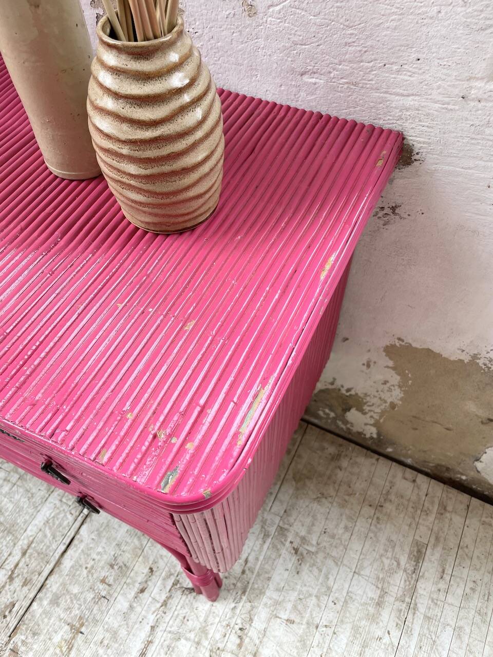 Vintage pink rattan chest of drawers