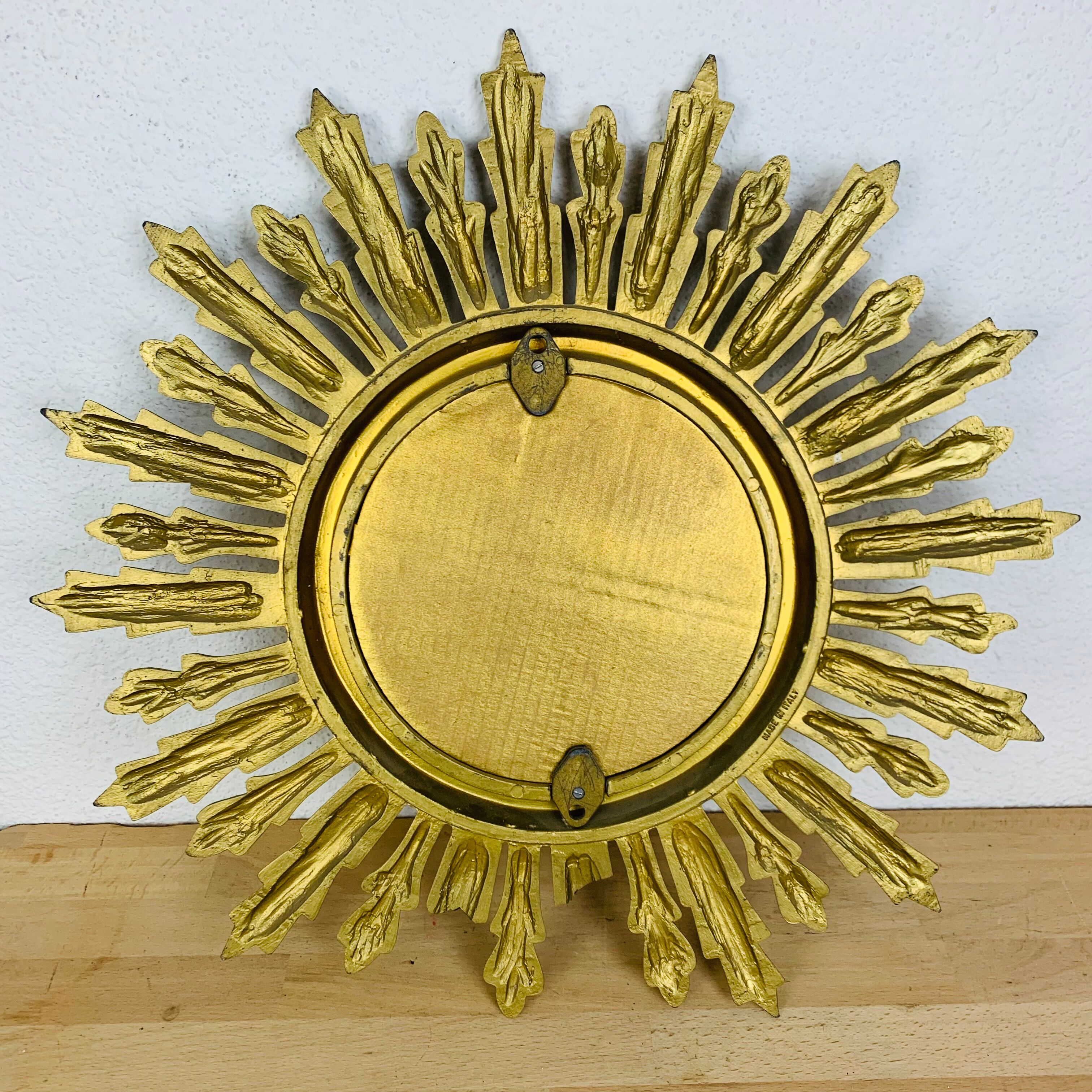 Miroir soleil doré italien années 60 résine
