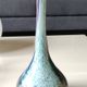 Ball vase soliflore with a long chimney neck. In speckled glass in the Murano style.