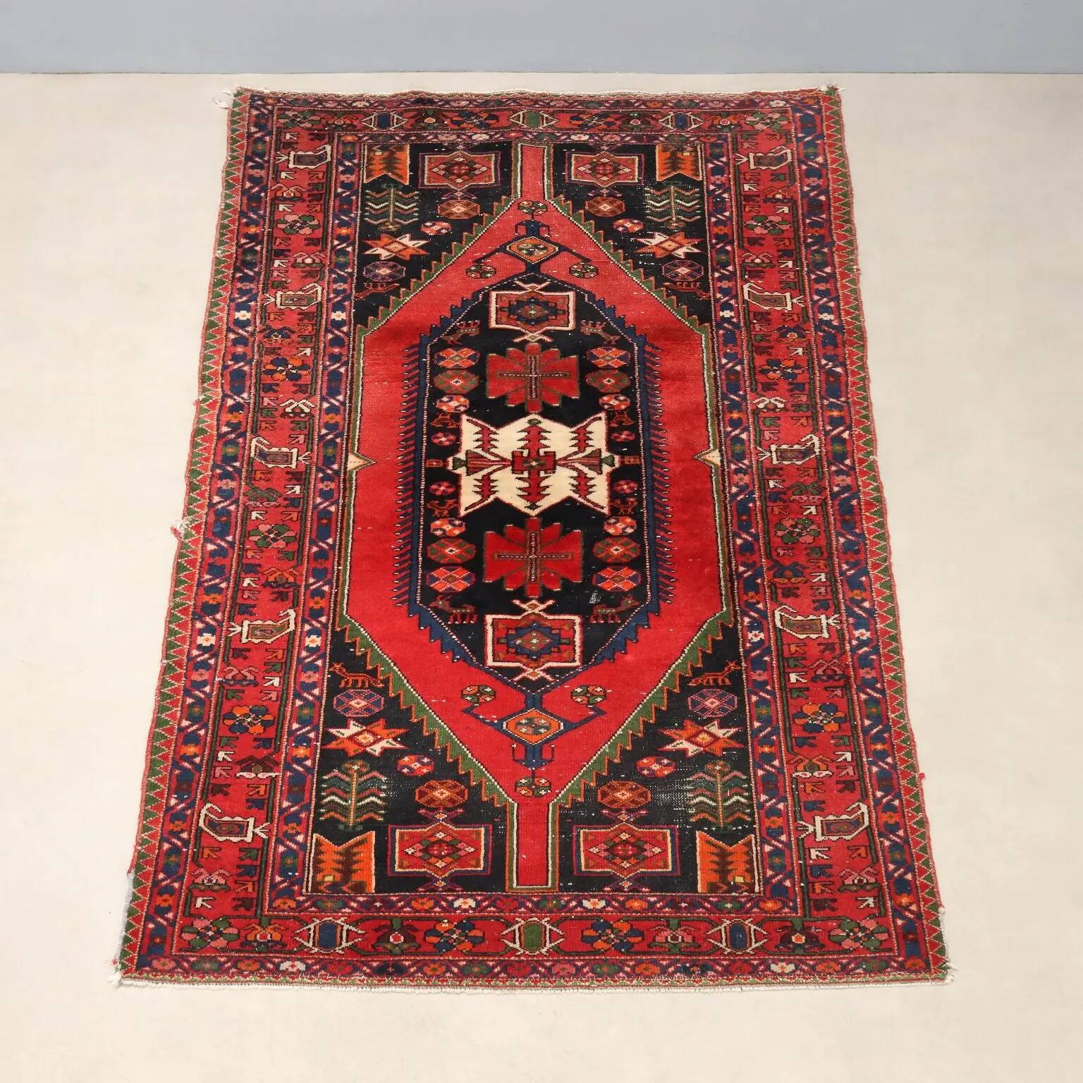 Ancient Asian rug made of cotton and wool, large knot.