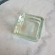 Glass tile pocket emptier