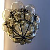 Blown glass and metal lantern