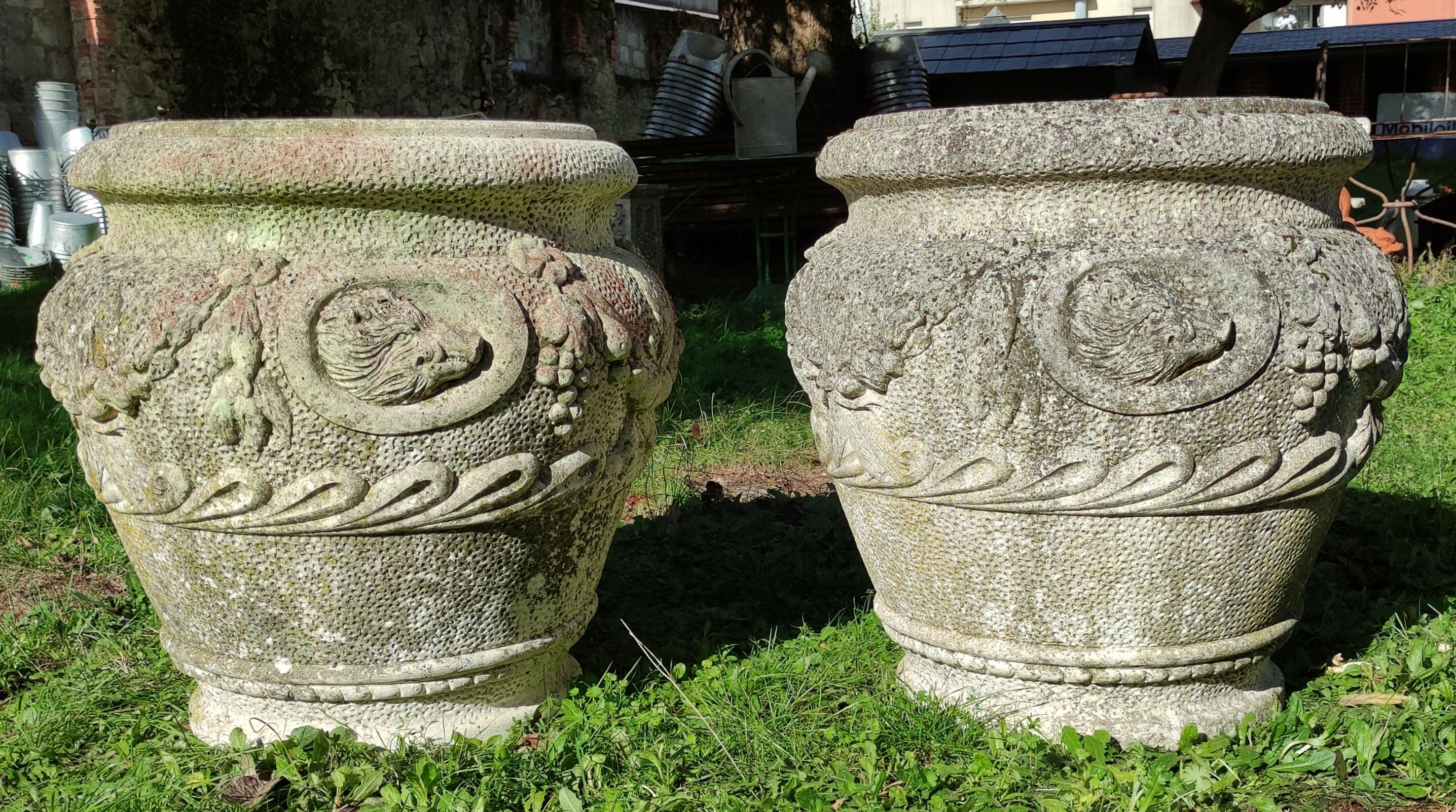 Pair of Medici pot caches in reconstituted stone