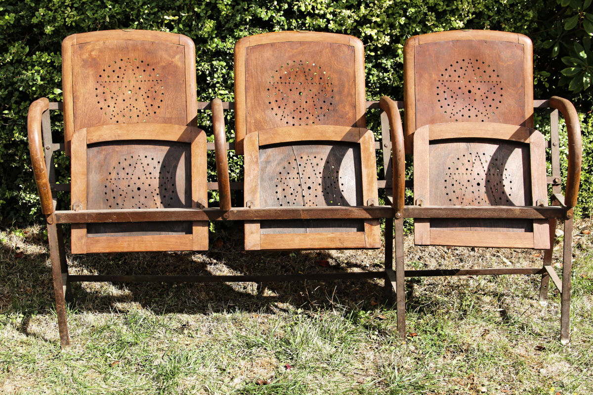 Row of theater folding seats, early twentieth century