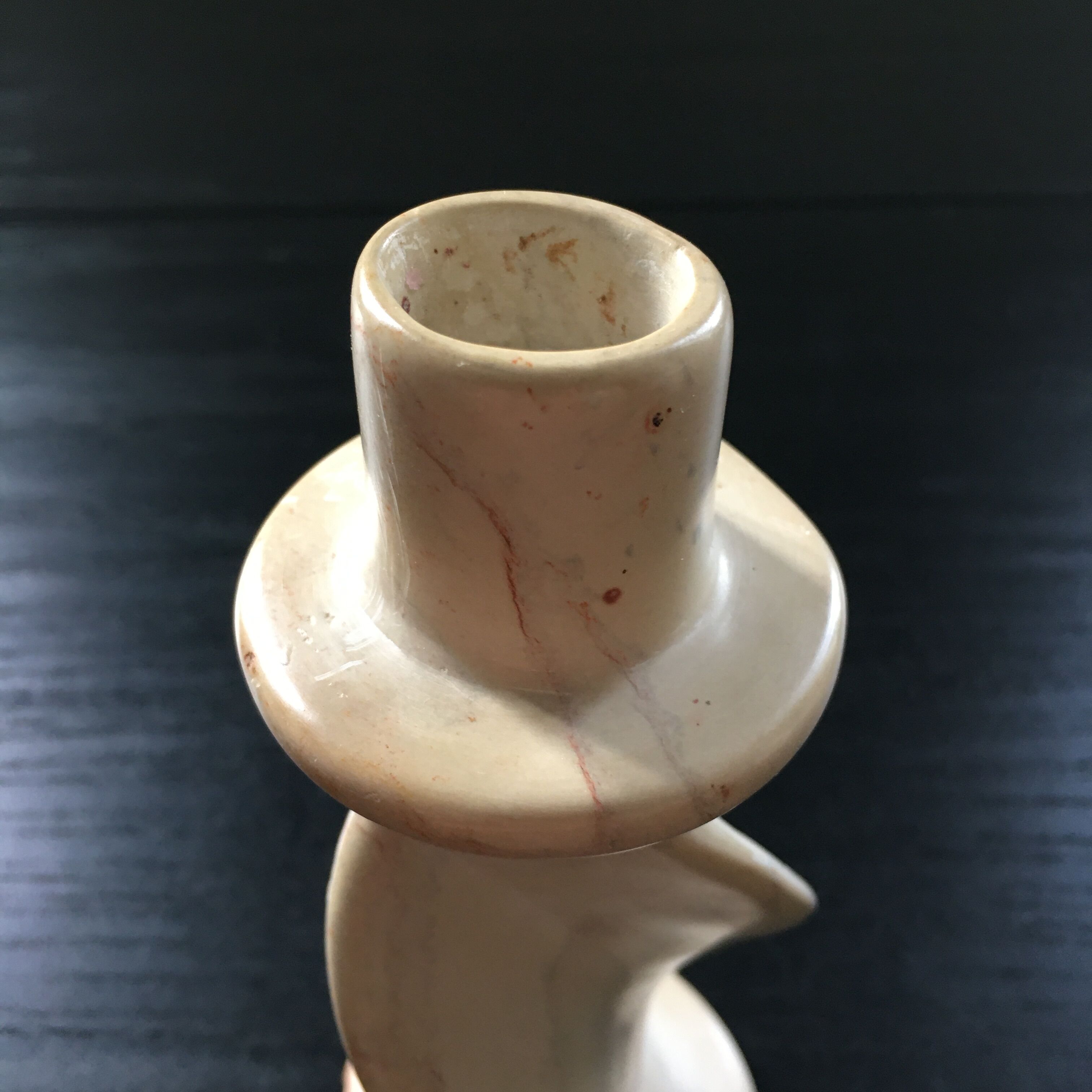 Twisted stone candle holder