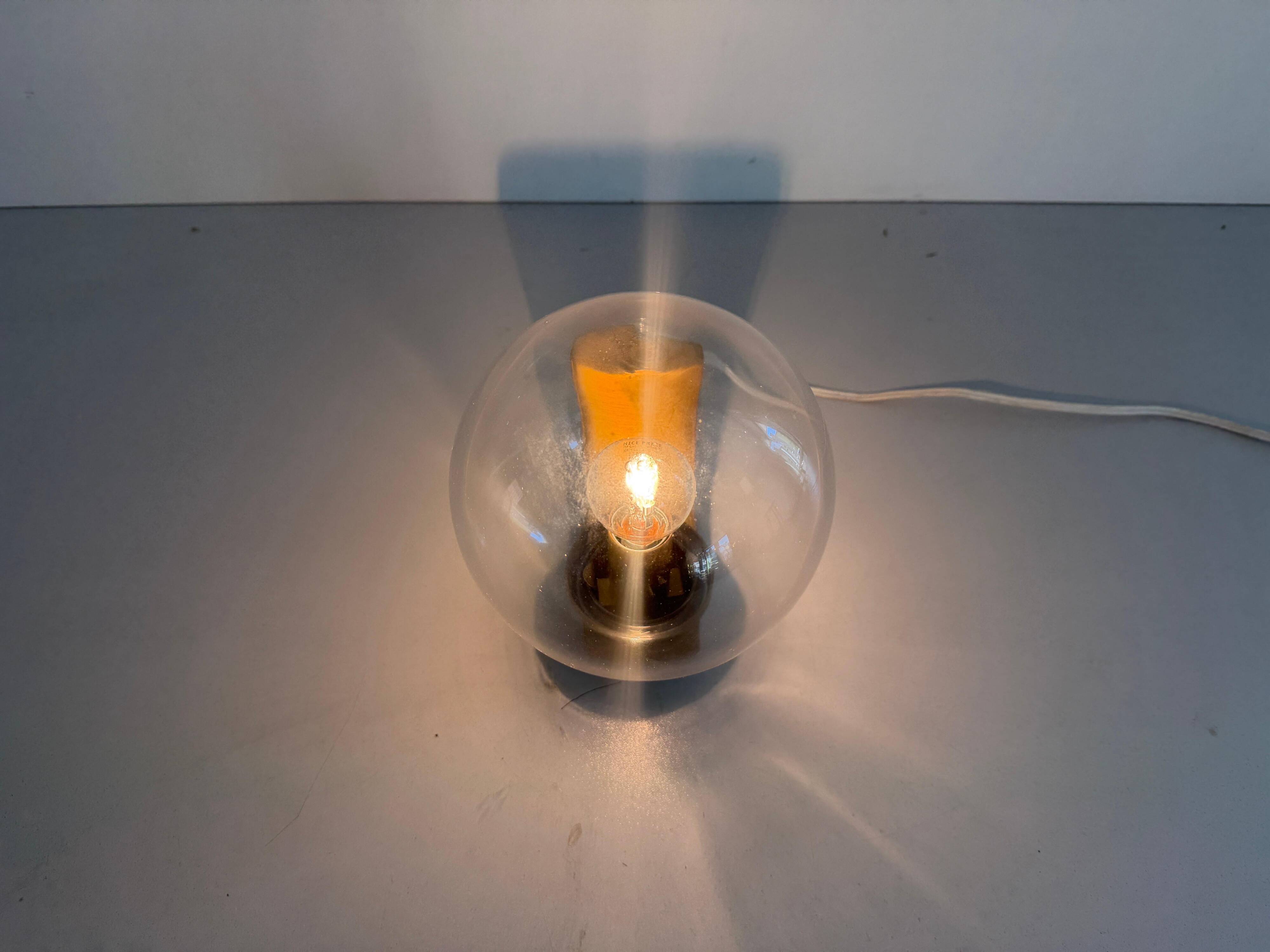 Simple glass and brass wall light from the mid-century, 1960, Germany.