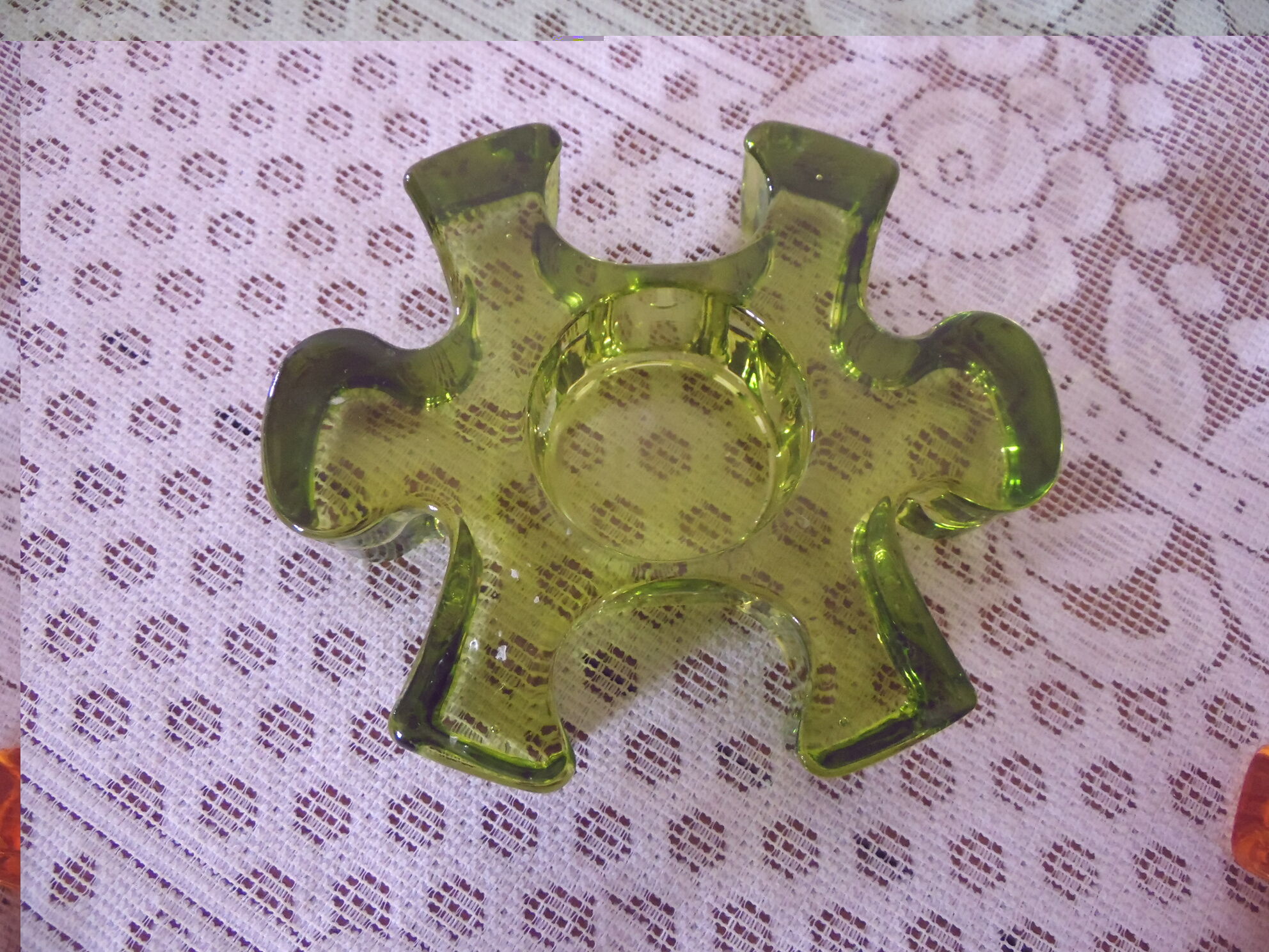 Candle holder shape puzzle piece
