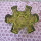 Candle holder shape puzzle piece