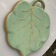 Ceramic underside, light green and gold, vintage leaf shape