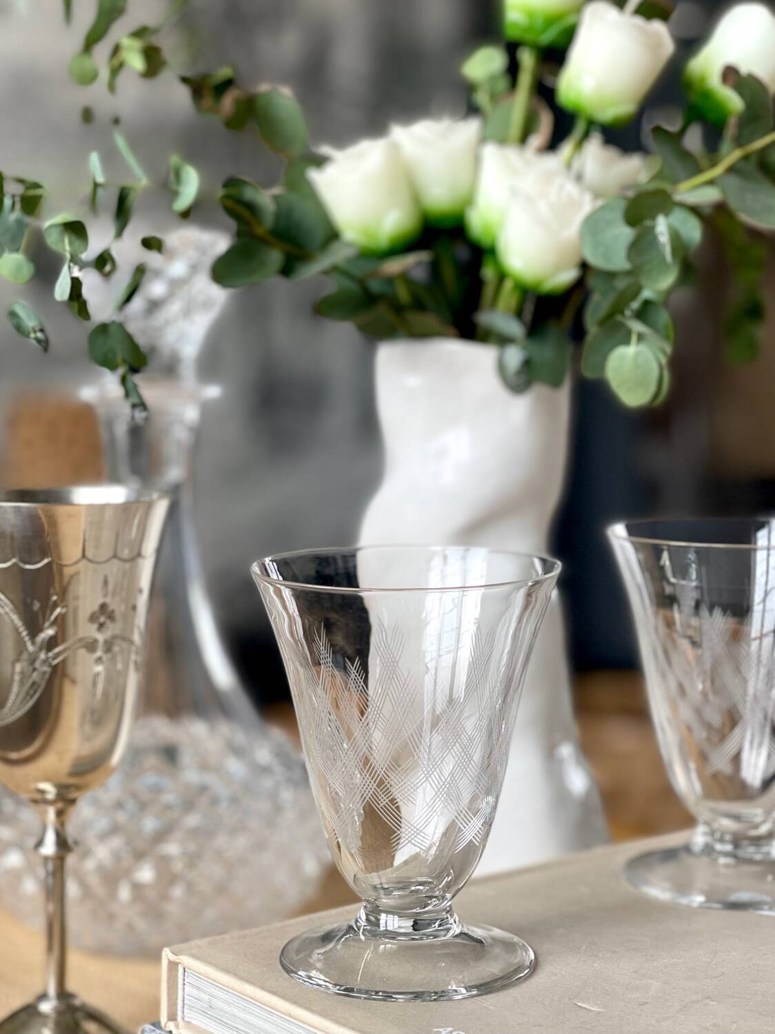 6 engraved wine glasses.