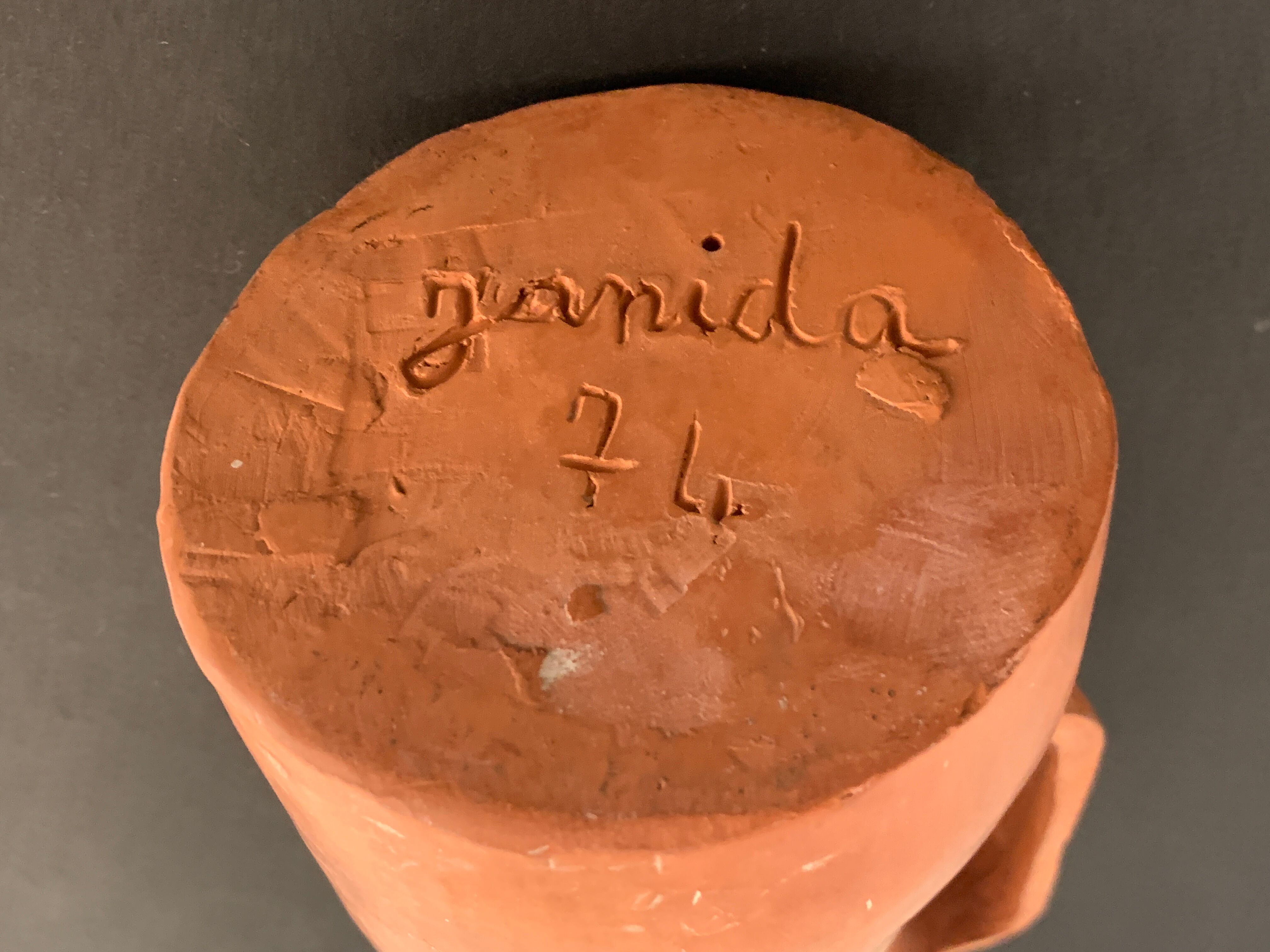 Signed terracotta pitcher or vase