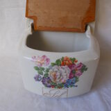 Saltbox in earthenware flowers cover wood