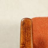 Scandinavian design curly orange armchair by H.Lis