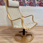 ARMCHAIR AND ITS OTTOMAN "SCANDINAVIAN DESIGN".