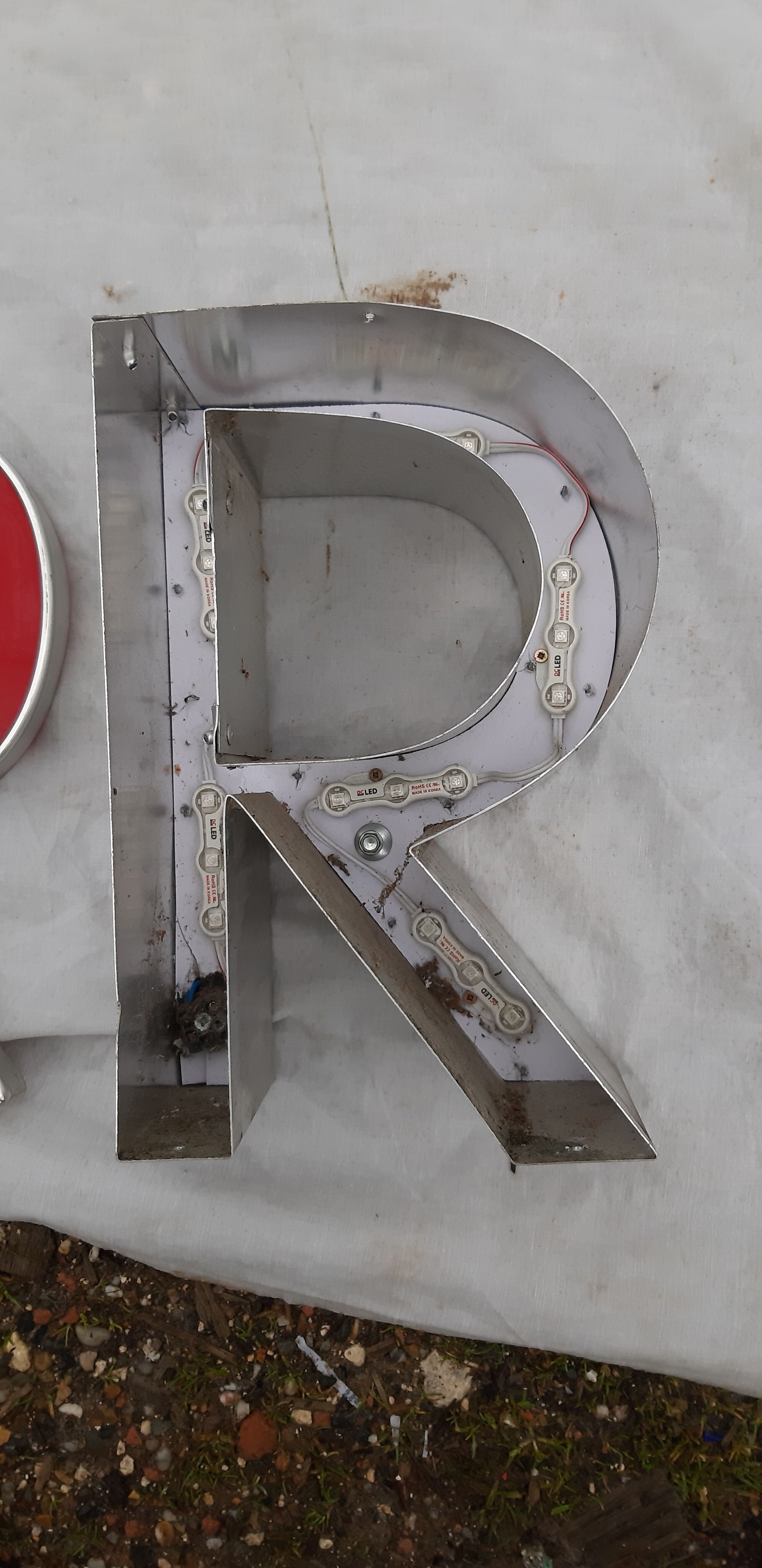 9 luminous industrial letters