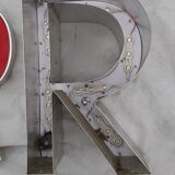 9 luminous industrial letters