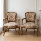Pair of Louis XV armchairs in floral fabric and wood
