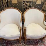 Paire de fauteuils bergères gondoles de style Louis XV