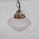 Mid-century opaque glass and brass pendant