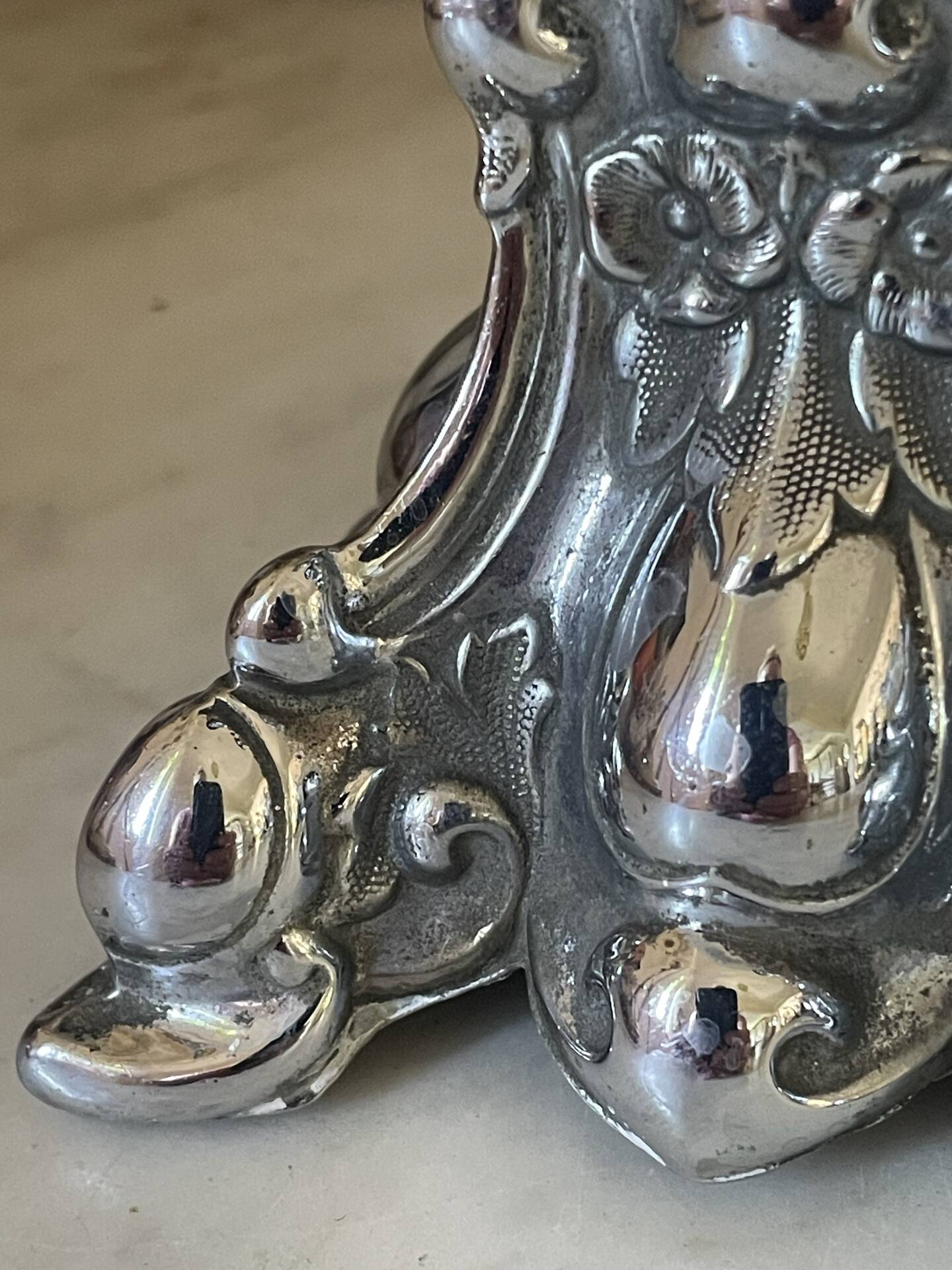 Pair of rococo silver-plated candlesticks