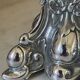 Pair of rococo silver-plated candlesticks