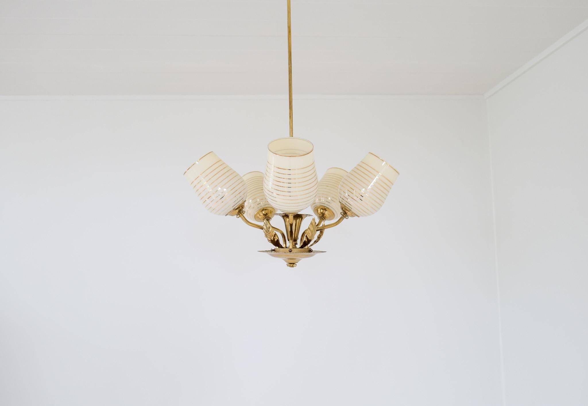 Mid-century brass and glass pendant light by Sario, Finland, 1950s.