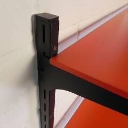 Tomado Holland - A. Dekker wall shelf, orange and black, 1970s