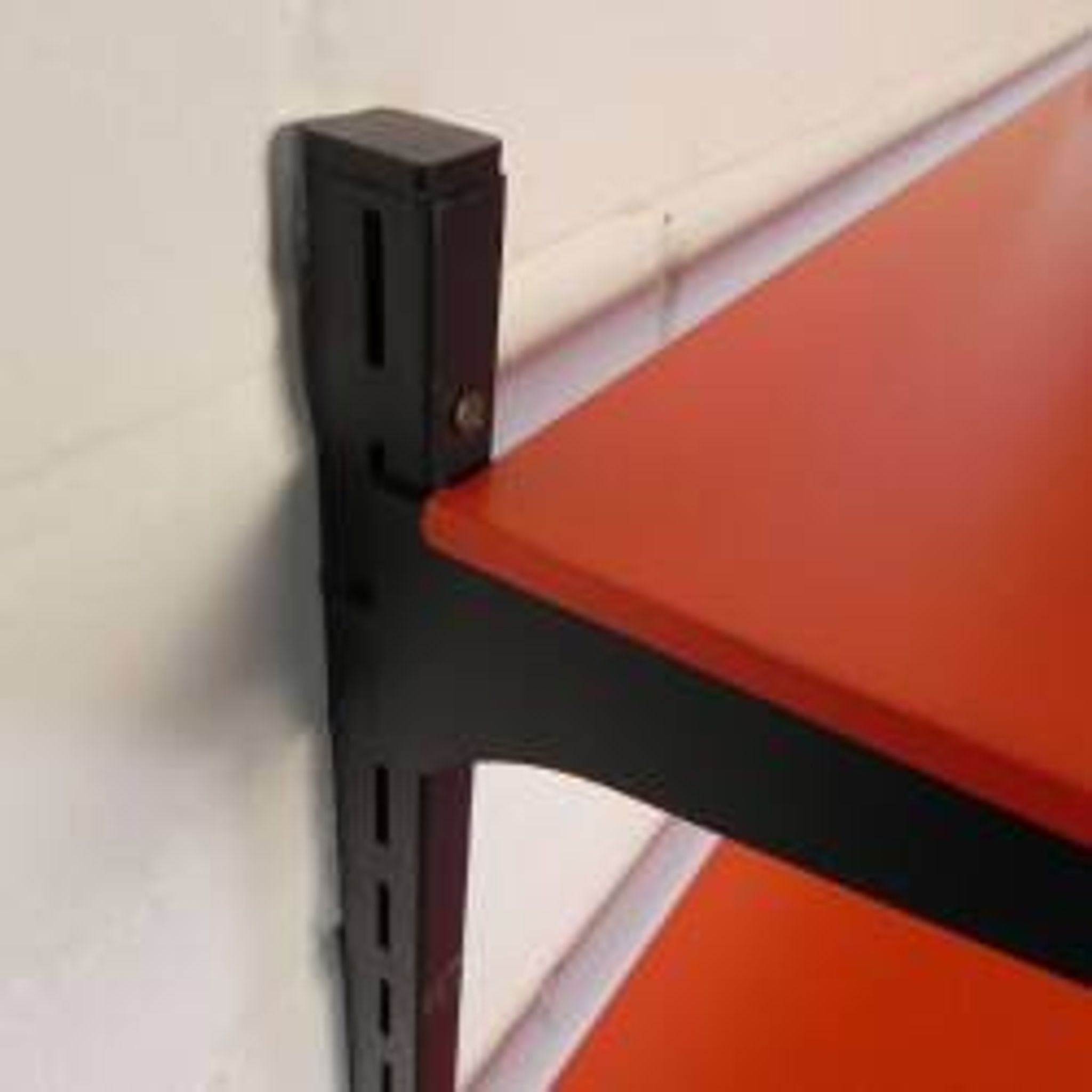 Tomado Holland - A. Dekker wall shelf, orange and black, 1970s