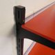 Tomado Holland - A. Dekker wall shelf, orange and black, 1970s