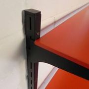 Tomado Holland - A. Dekker wall shelf, orange and black, 1970s
