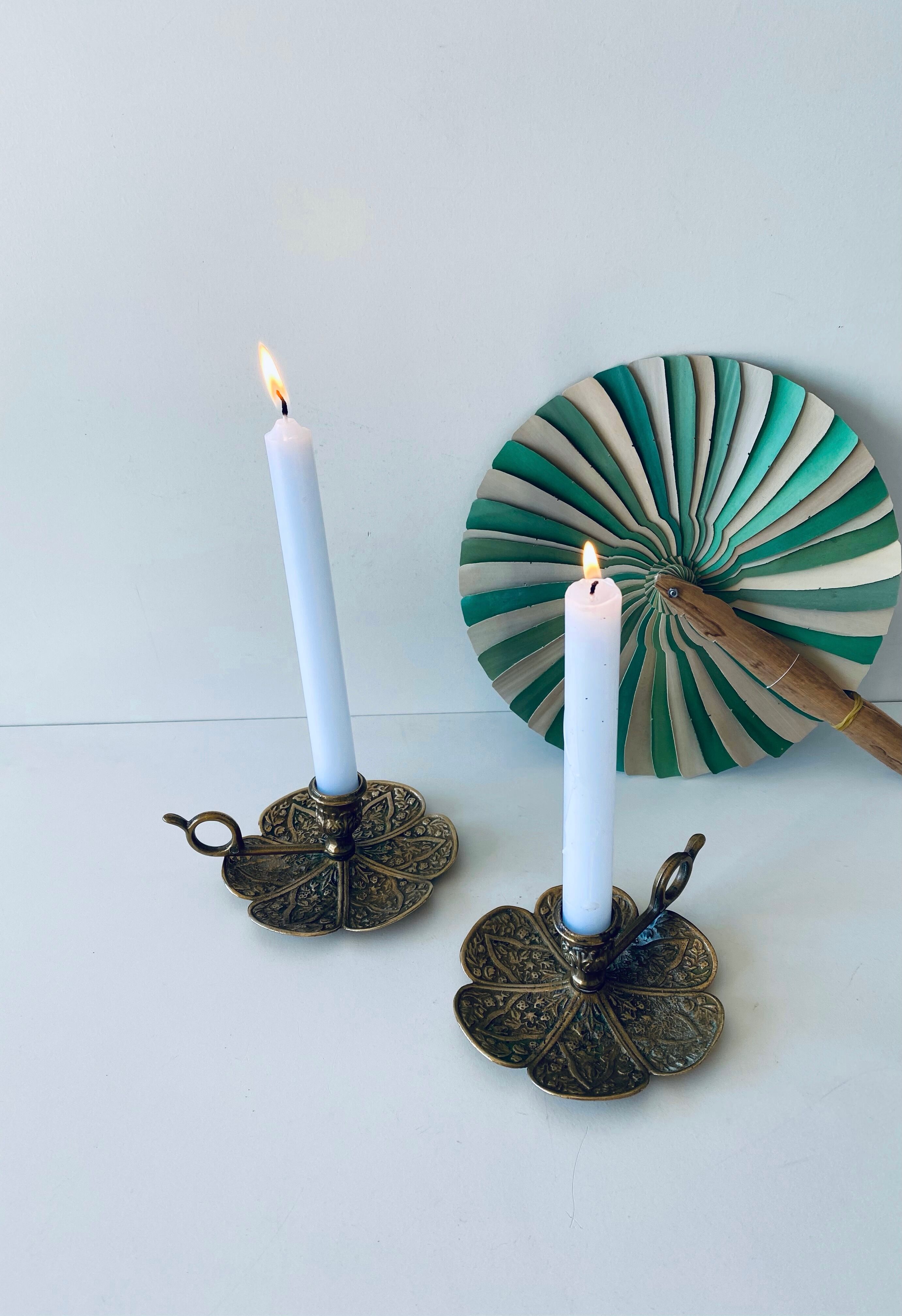 Pair of brass clover candlesticks