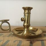 Thumb brass candlestick