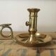 Thumb brass candlestick