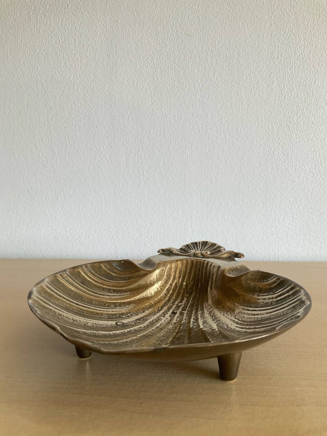 Vintage bronze shell emptier