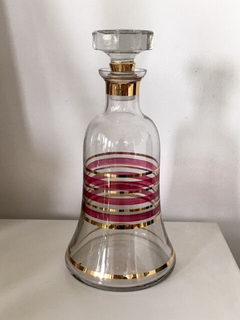 Glass carafe and two glasses