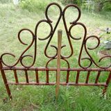 Curved wooden headboard