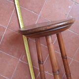 Turned wooden tripod stool