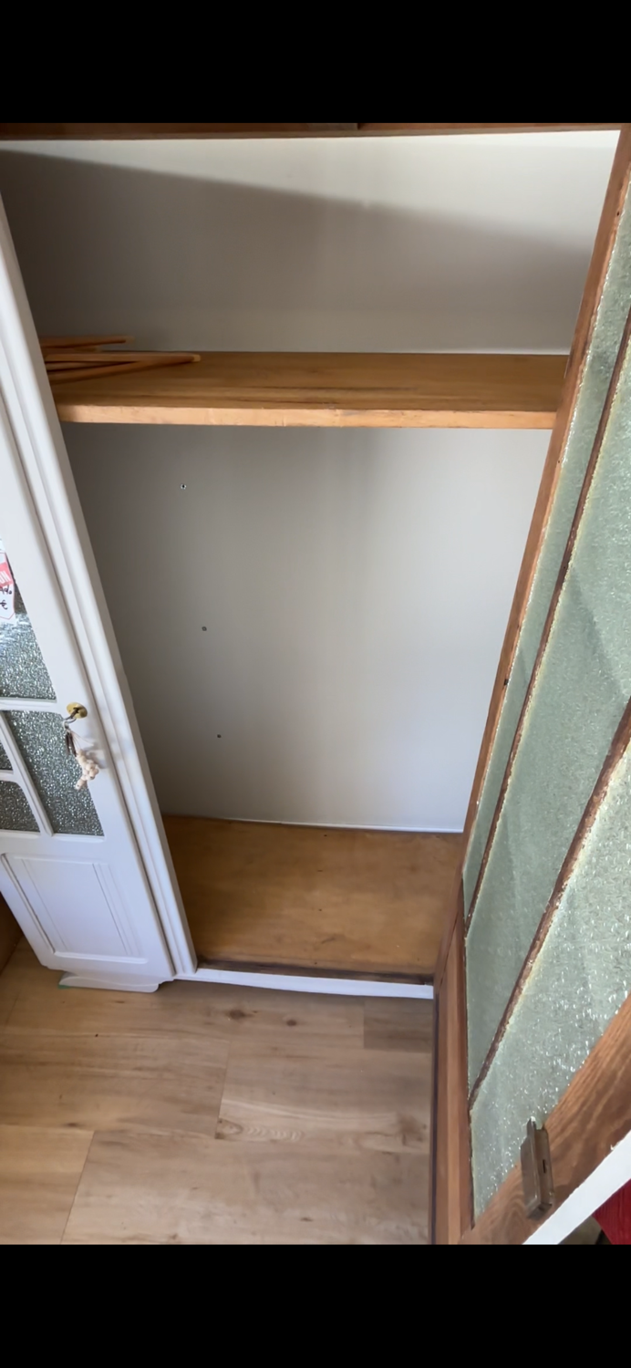 Glass-fronted Parisian wardrobe