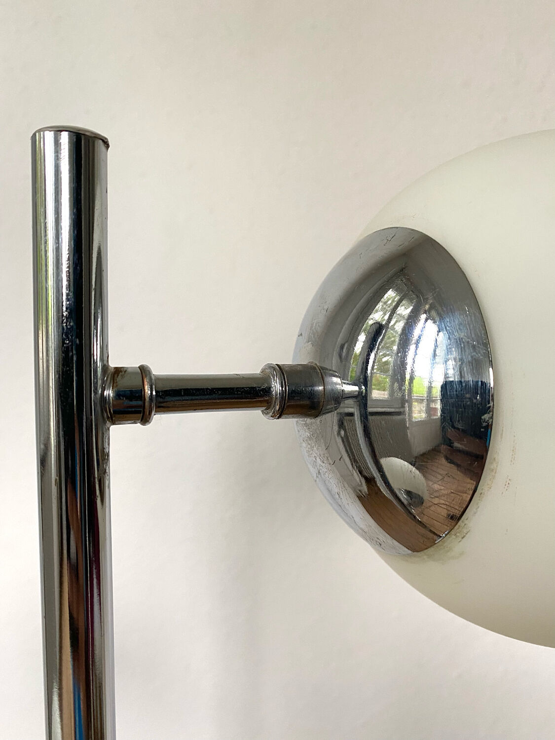 Vintage floor lamp has two opaque glass spheres