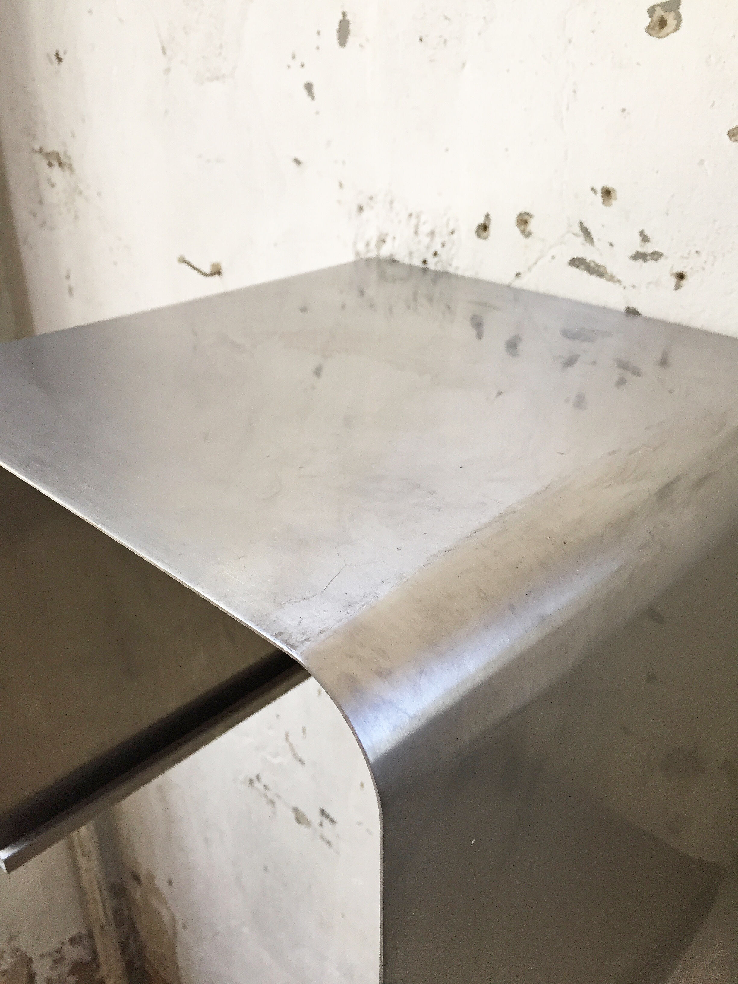 "Zig-zag" satin stainless steel shelf by Joelle Ferlande and François Monnet