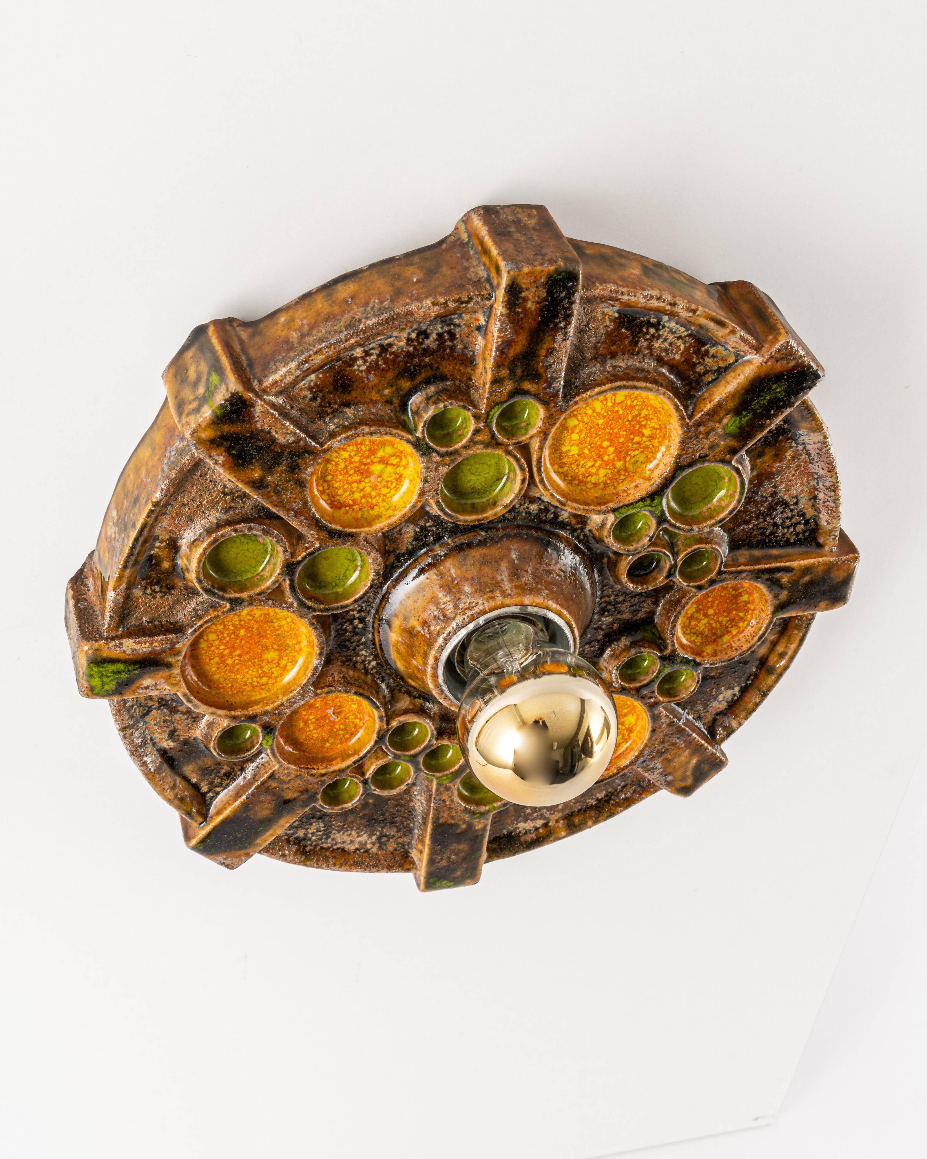 Sputnik wall lamp in brown and orange ceramic, Germany, 1970s.