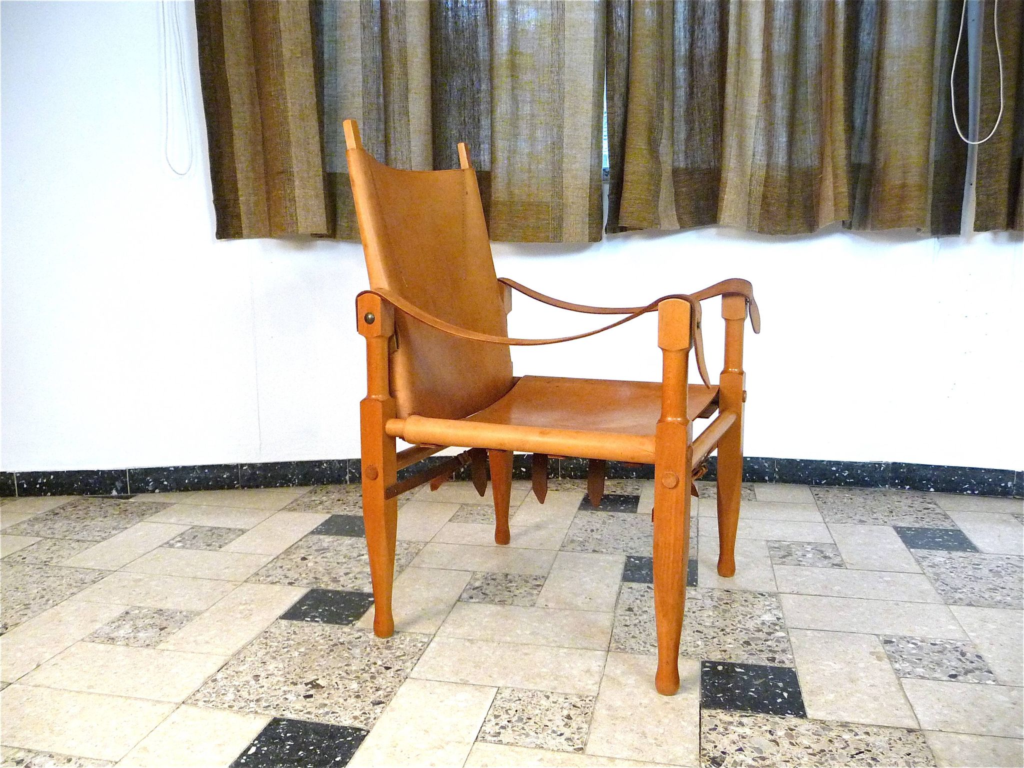 Safari chair in leather by Wilhelm Kienzle for Wohnbedarf, Switzerland 1950