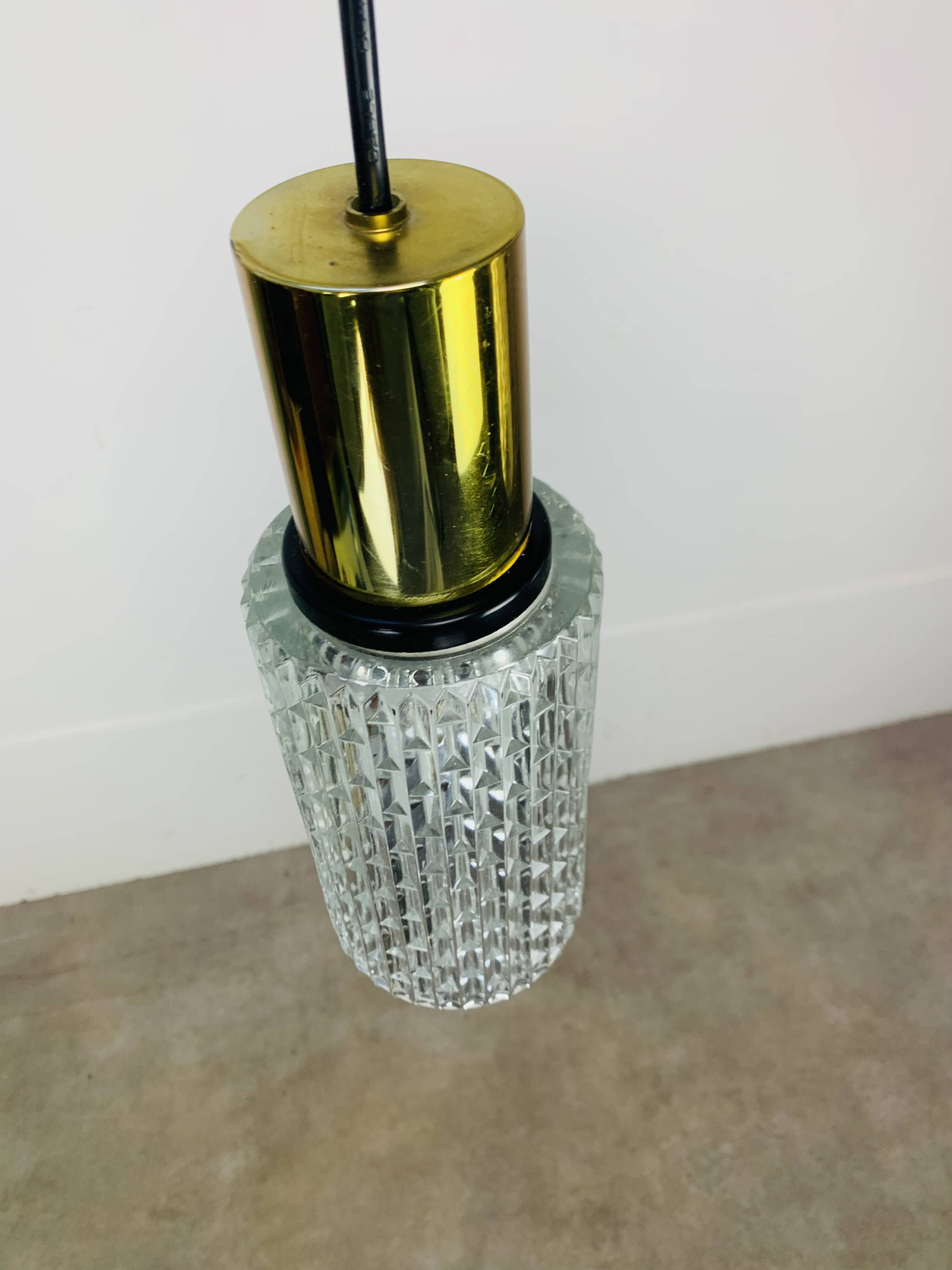 Pair of vintage cut glass pendant lights from the 1970s.