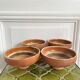4 old handcrafted pottery bowls