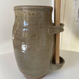 Old varnished stoneware pickle pot with tongs