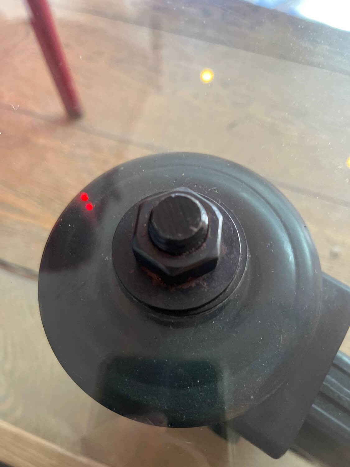 Gae Aulenti coffee table for Fontana Arte, transparent glass top with black cast iron supports, 1980s.